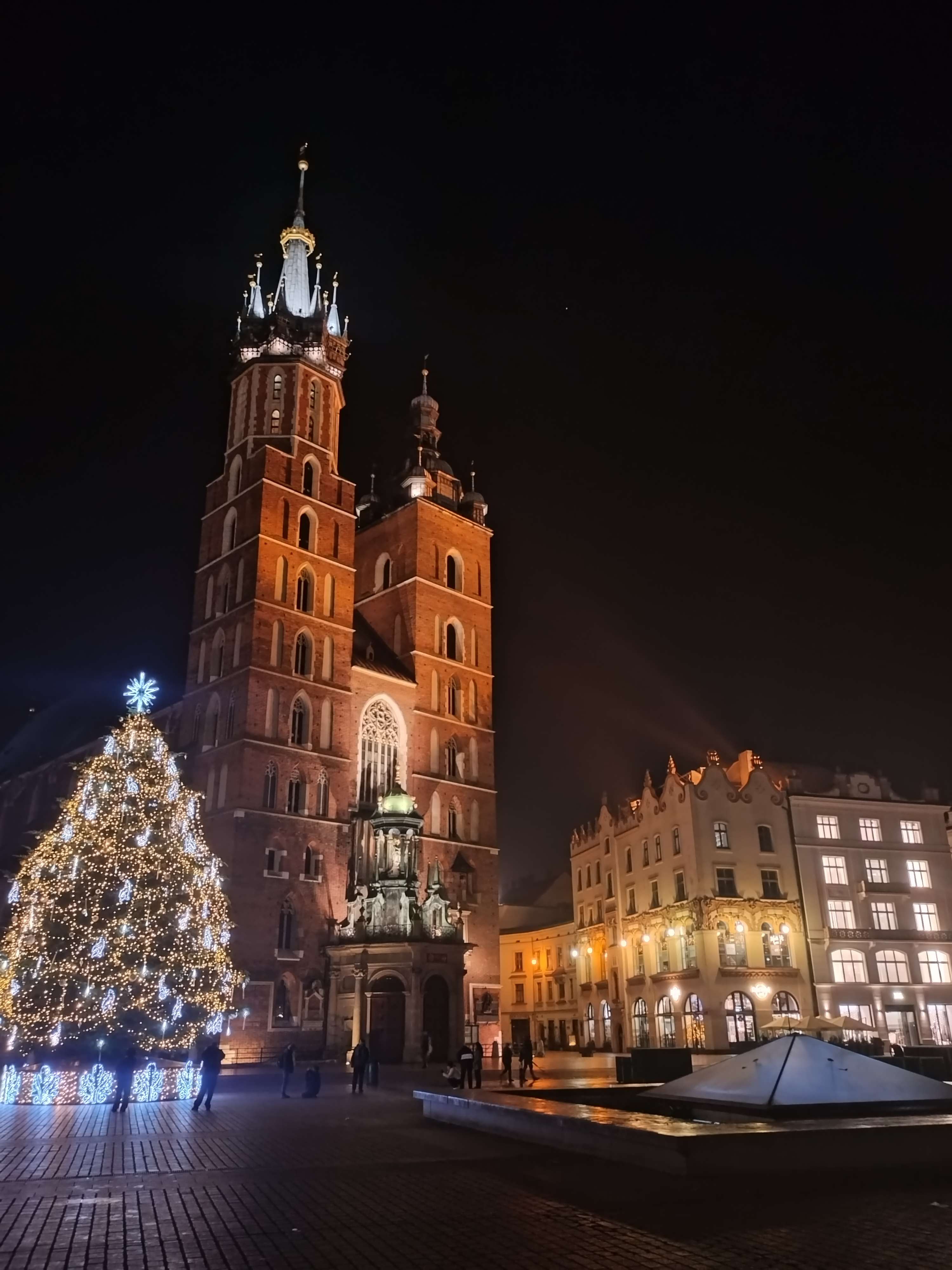 The outside of St Mary's Basilica, accompanied by Christmas tree